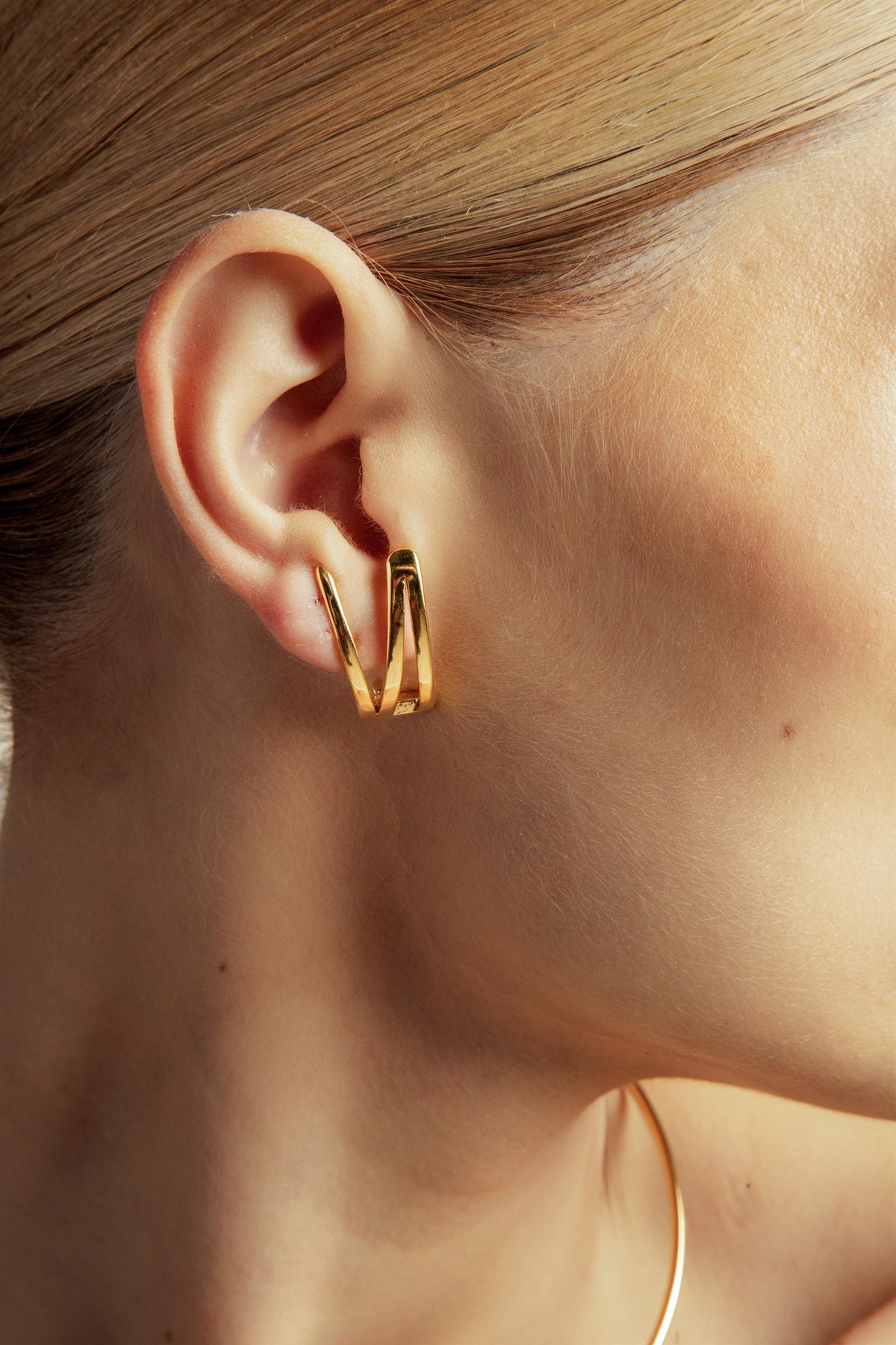 Brinco Ear Hook Verso Ouro