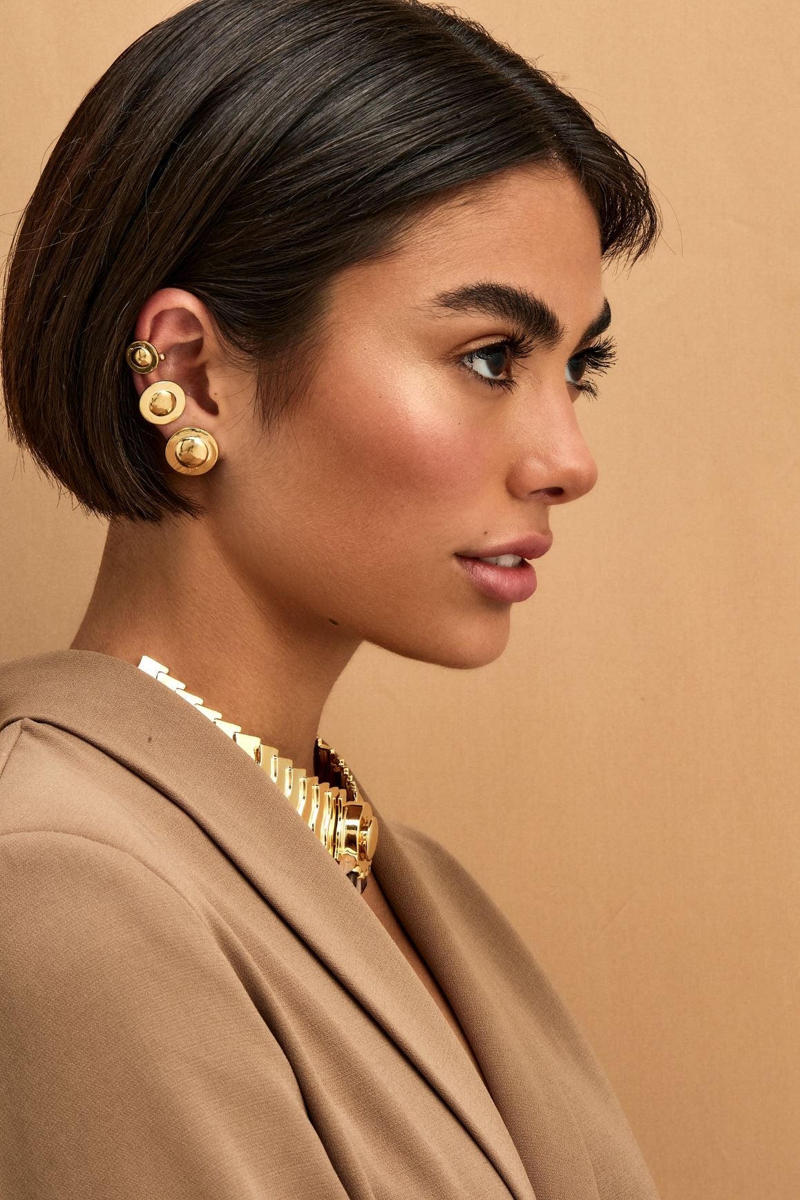 Piercing Golden P Essencia Positividade